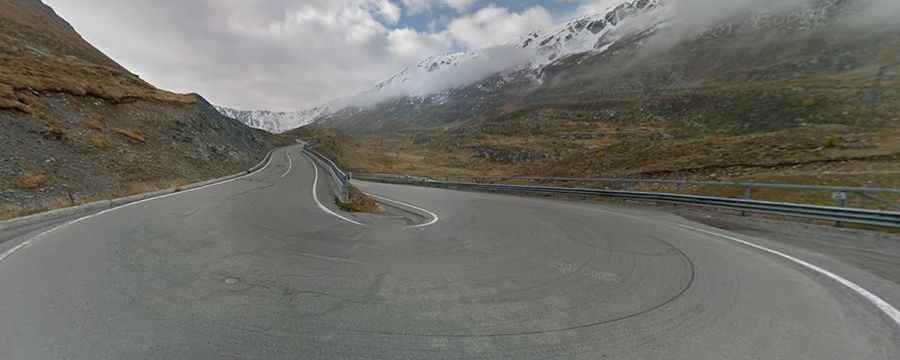 A beautiful paved road to Eira Pass in the Alps