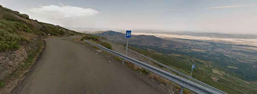 A bumpy paved road to the summit of Puerto de Peñanegra in Avila