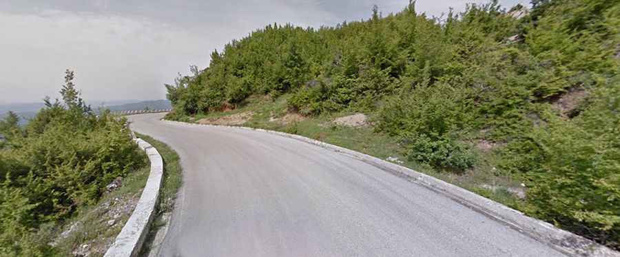 A curvy paved road to the summit of Krraba Pass