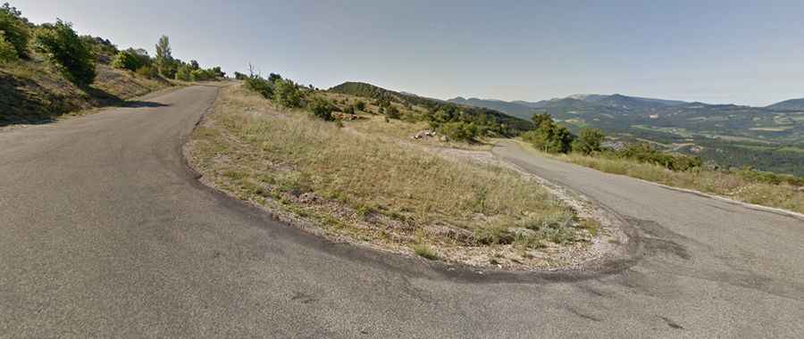 A hairpinned paved road to the summit of Col de la Chaudiere