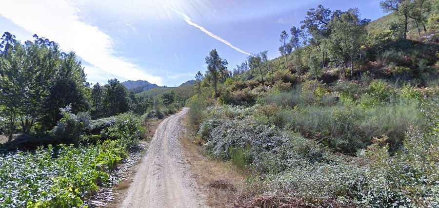A narrow unpaved road to Covas do Monte in Portugal