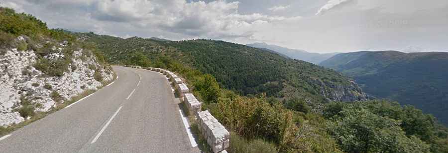 A paved curvy road to Col de Castellaras