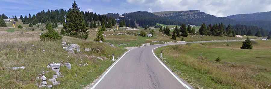 A paved road to Coe Pass in the Venetian Prealps