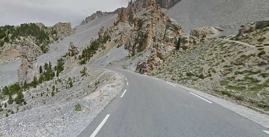 A paved road to Col de la Platriere in the French Alps