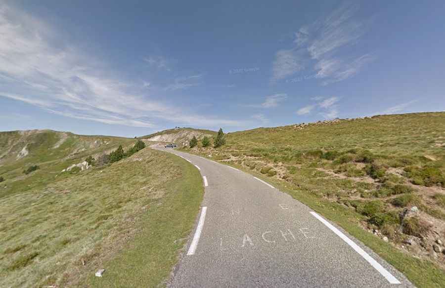 A paved road to Port de Pailheres heading deep into the Pyrenees