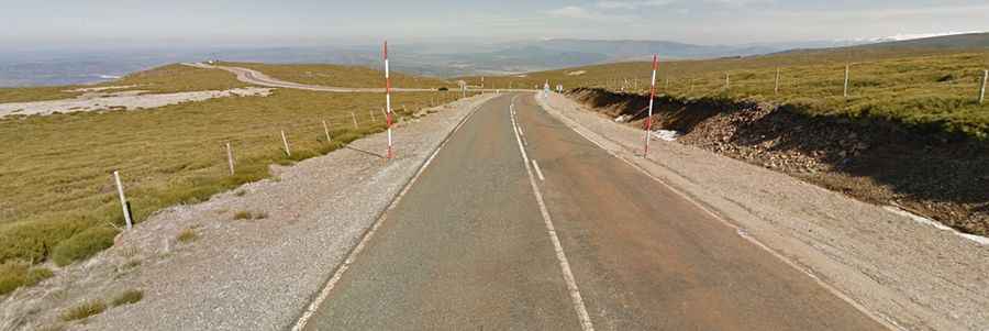 A paved steep road to La Covatilla in Castile and Leon
