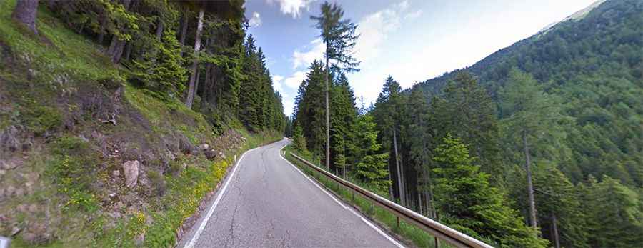 A scenic paved road to Lavaze Pass in the Dolomites