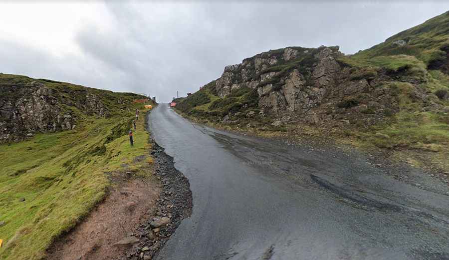 A scenic steep road to Quiraing Pass on the Isle of Skye