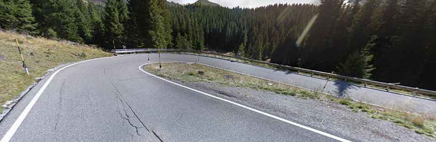 A serpentine road to the summit of Rolle Pass in the Dolomites