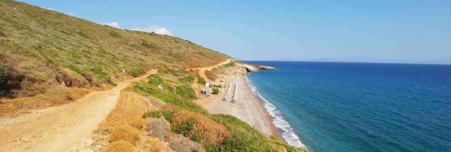 A wild gravel road to Lagada Beach in Greece