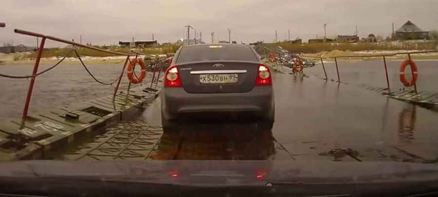 Crossing the hair-raising Nadym River Bridge in Siberia