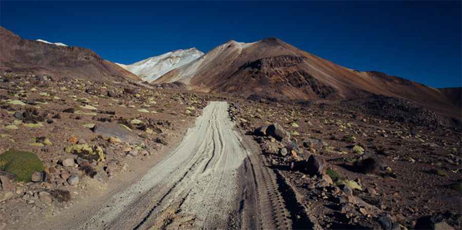 Driving a 4x4 mine road to Acotango Volcano in the Andes