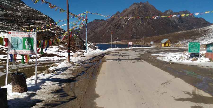 Driving the challenging road to Se La Pass in the Himalayas