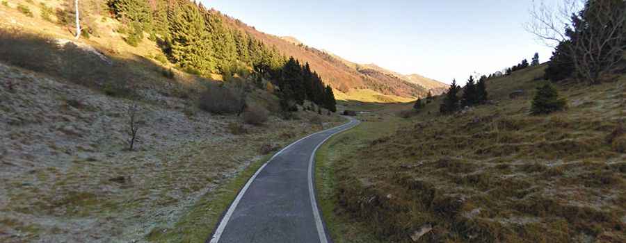 Driving the curvy and narrow road to Cason di Lanza Pass in the Alps