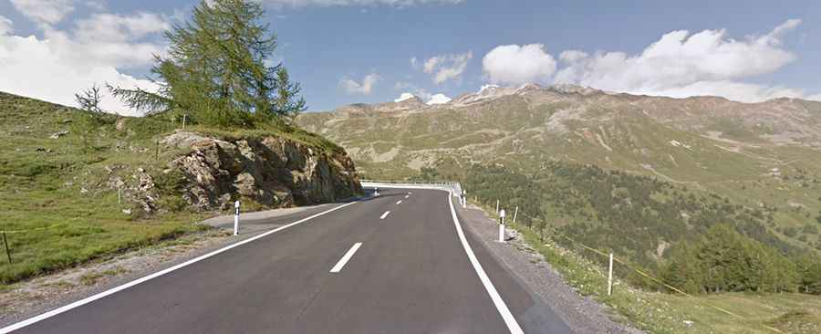 Driving the iconic paved road to Bernina Pass in the Alps