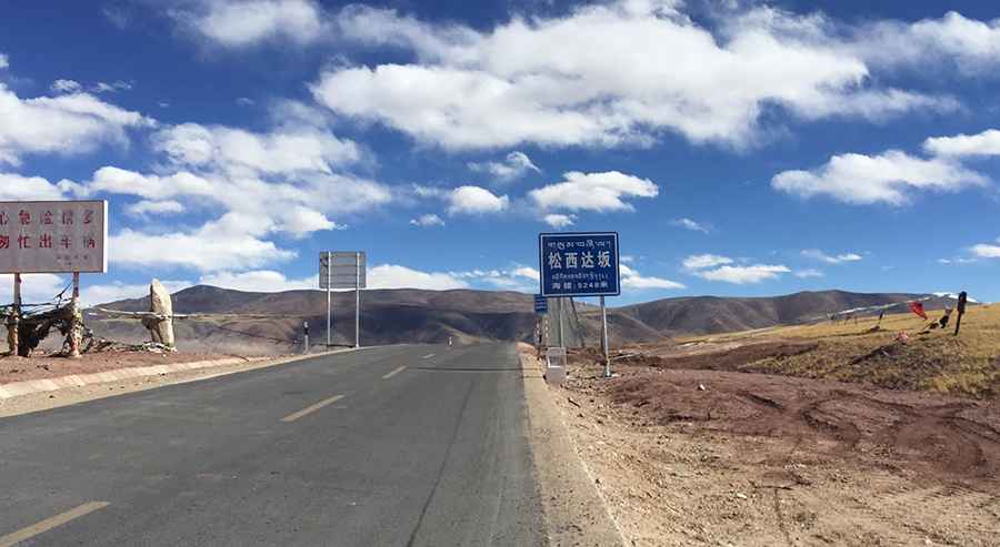 Driving the wild paved road to Shan Da Ban