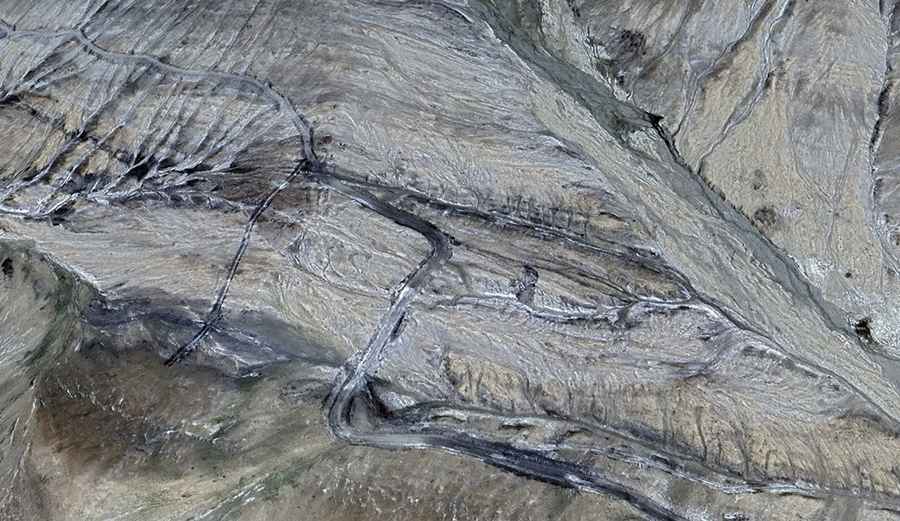 How challenging is the road to Qiewulida Yiding Biele Pass?