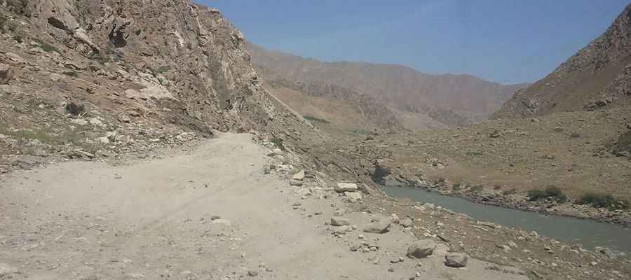 How long is the road from Dowshi to Puli Khumri?