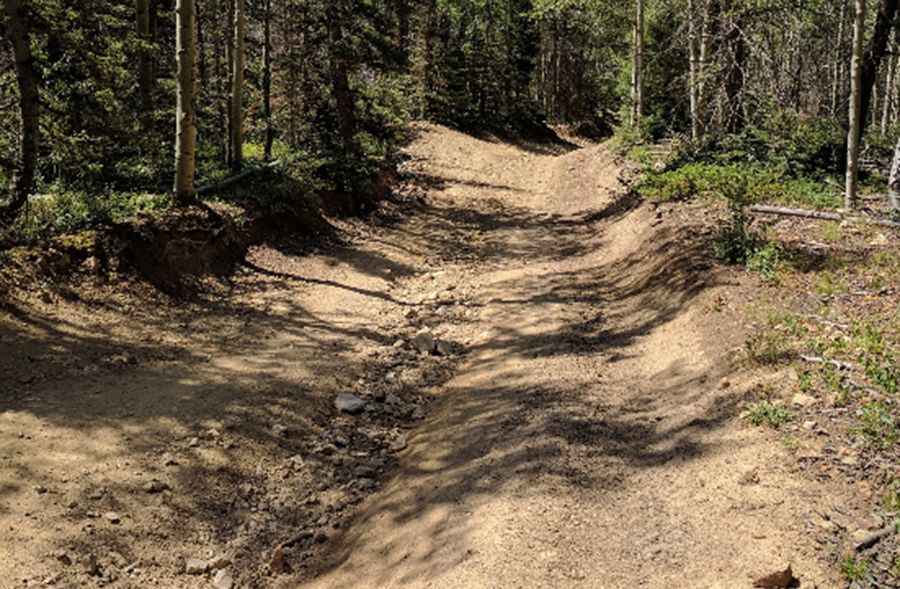 How long is the road to Greenie Peak?