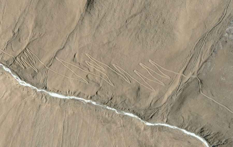 How long is the road to Kigunaru Pass?