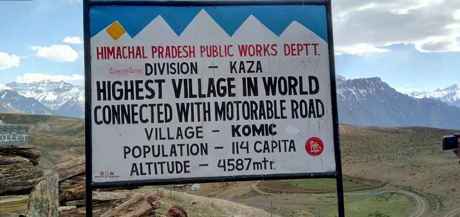 Is Komic the world's highest village connected with a motorable road?