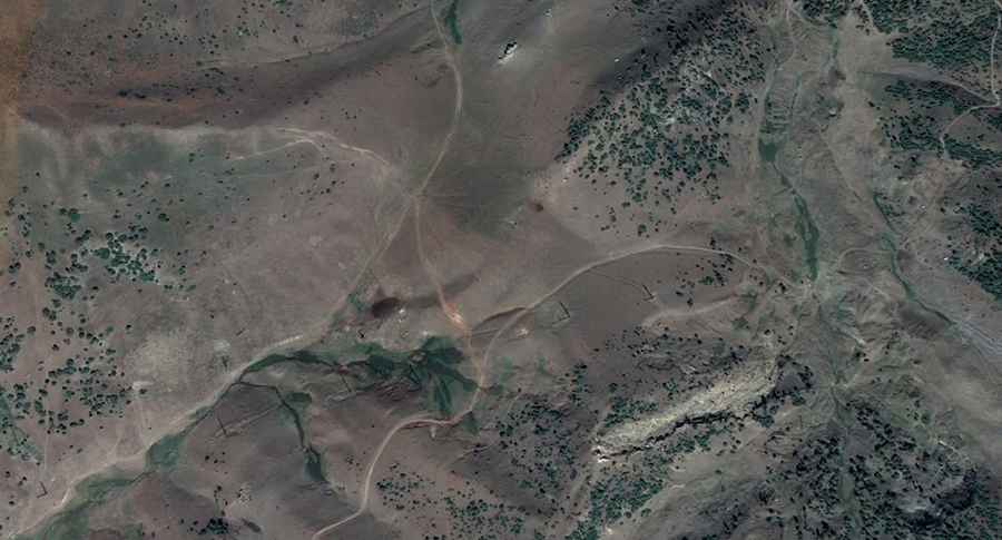 Is the road through Askaly-Bell Pass challenging?