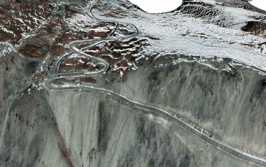 Is the road to Kyakyen La unpaved?