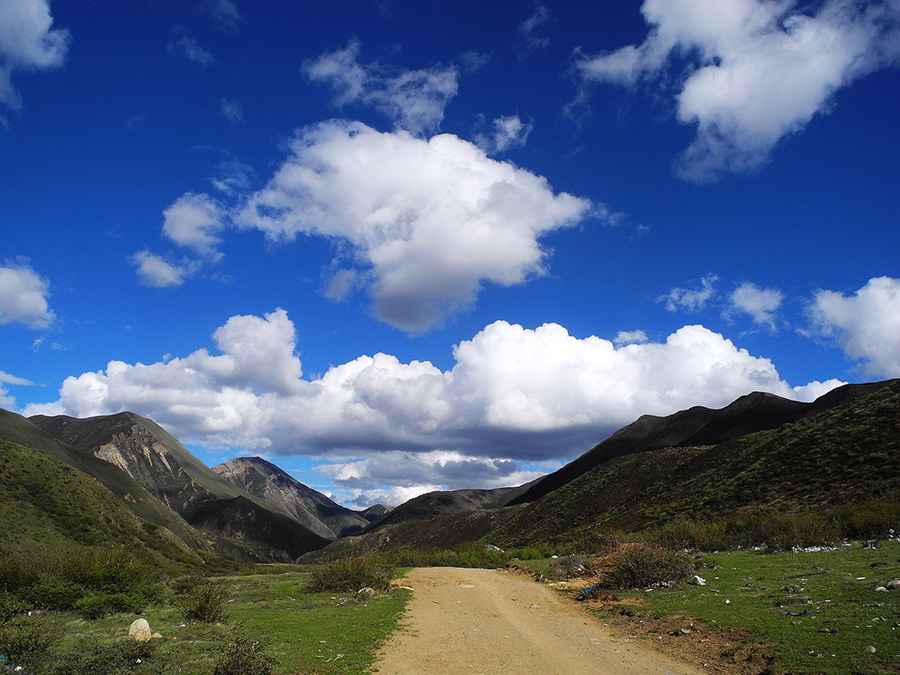 Is the road to Men La paved?