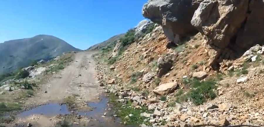 Is the road to Mount Kyllini unpaved?