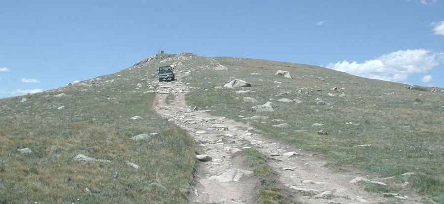 Is the road to North Twin Cone Peak unpaved?
