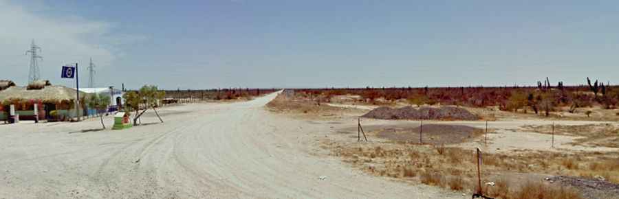 Is the road to Puerto Cancún unpaved?