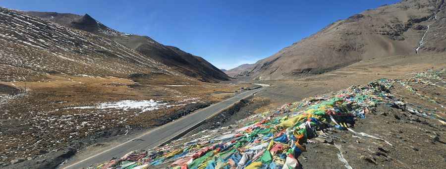 Karo La: enjoy a paved road among the clouds