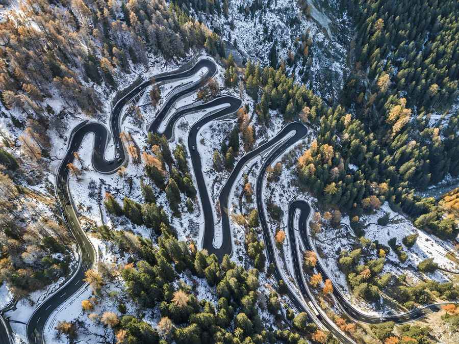 Maloja Pass is a curvy road in the Swiss Alps
