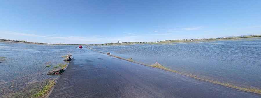 Shell Island Causeway is covered by sea water at high tide