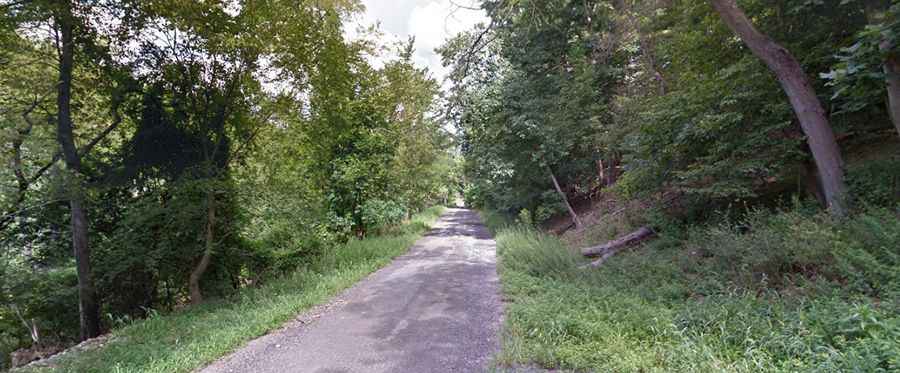 The haunted Irwin Road in Pennsylvania is covered by a low-hanging blue mist