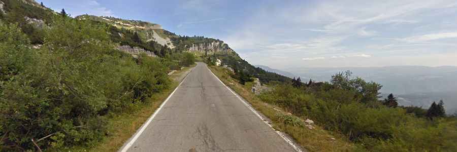 The paved road to Valbona Pass in the Venetian Prealps