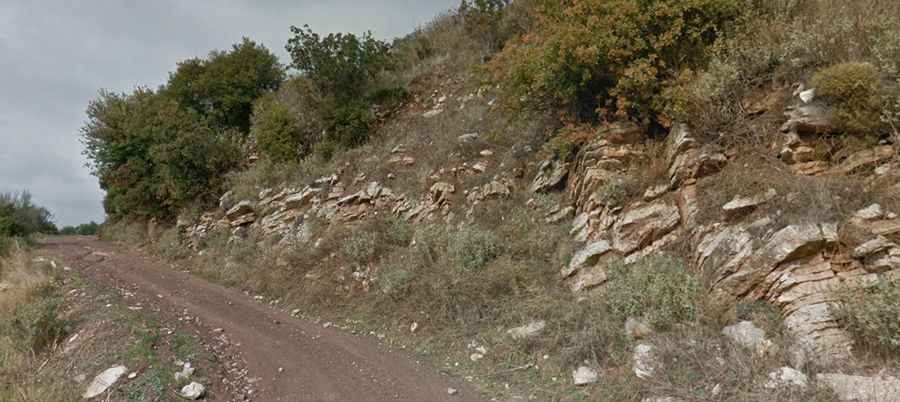 The steep unpaved road to Mount Ithome