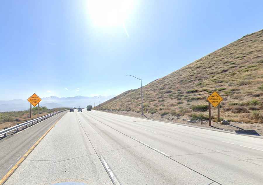 When was the road through Cajon Summit in California built?